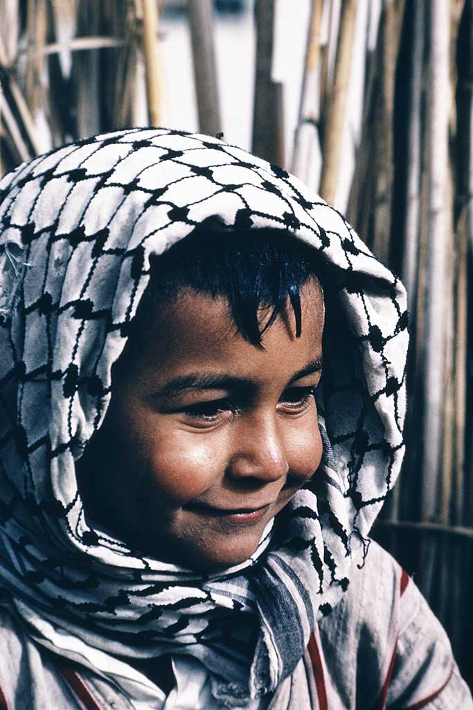 Tor Eigeland - Typical Marsh Arab boy. Healthy and smiling.