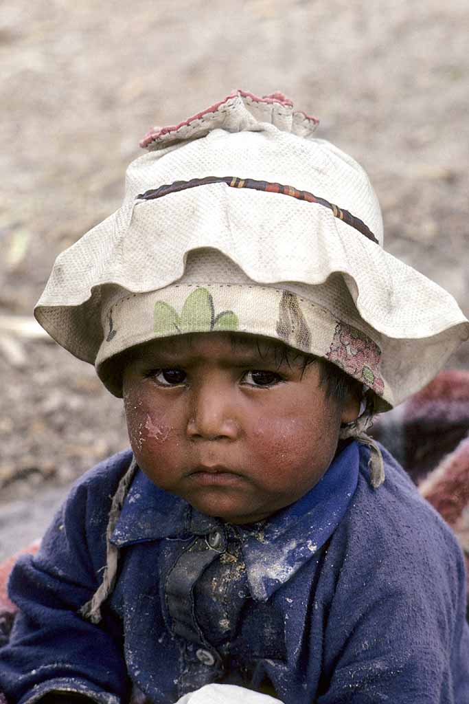 Tor Eigeland - Mexico. This little Sierra Tarahumara Indian boy is Juanito. A bit disgruntled in his two hats. W3390