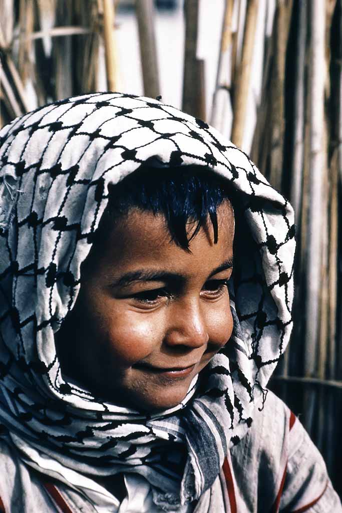 Tor Eigeland - A happy young Marsh Arab boy, Iraq 1967, prior to the draining of the marshes. W8089